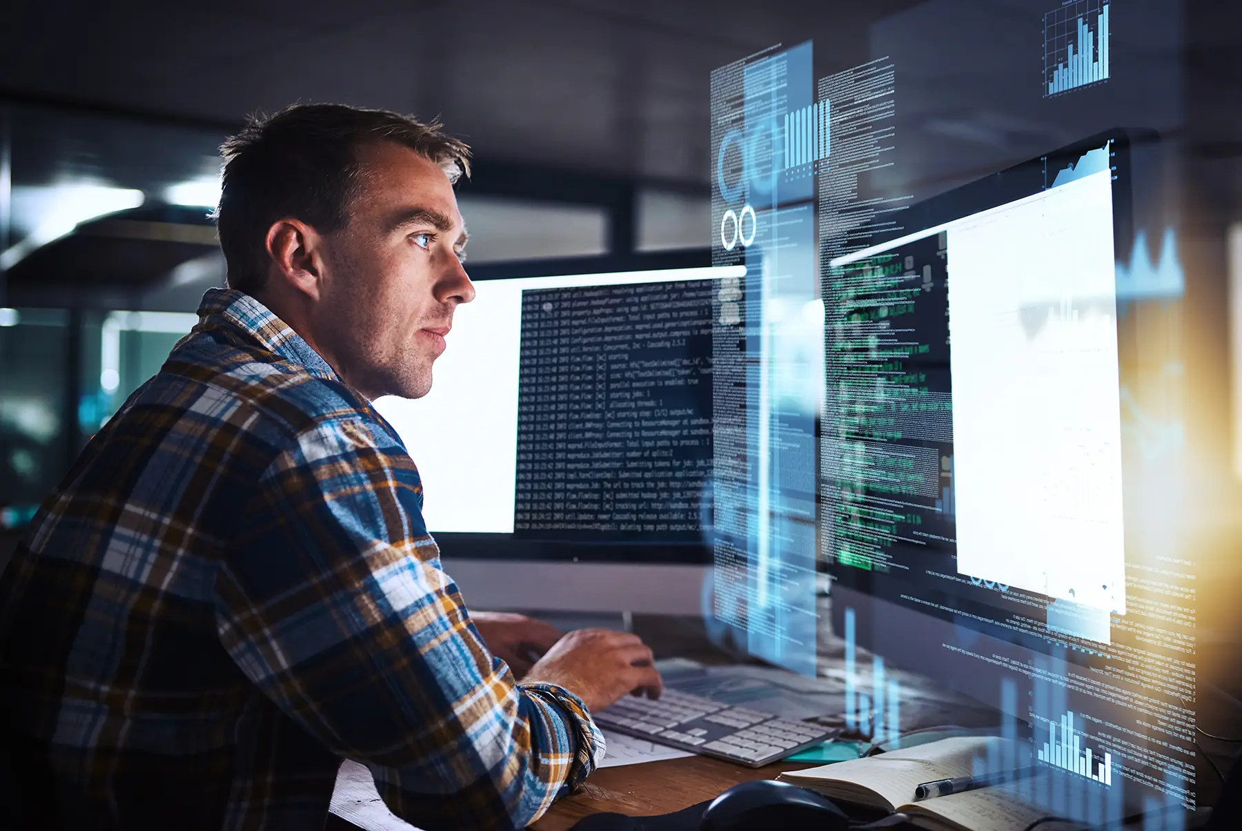 IT worker looking at lines of codes